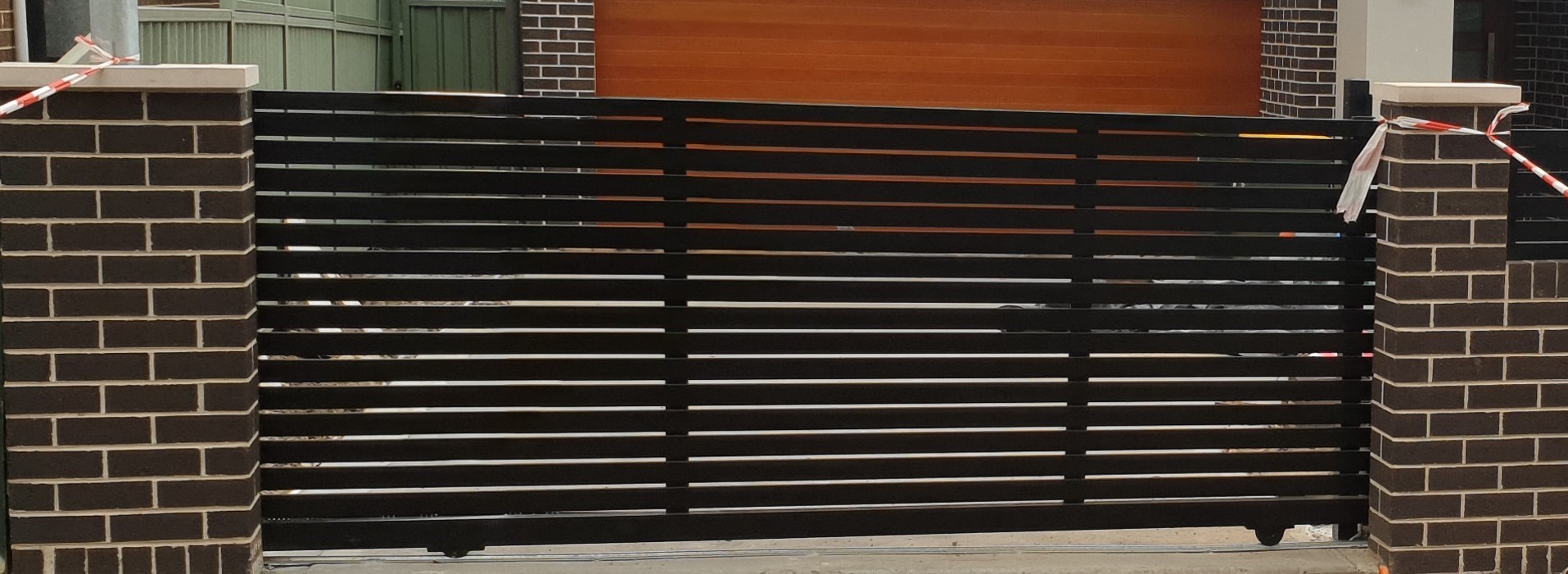 65x16 Horizontal Slat Automatic Driveway Gate.